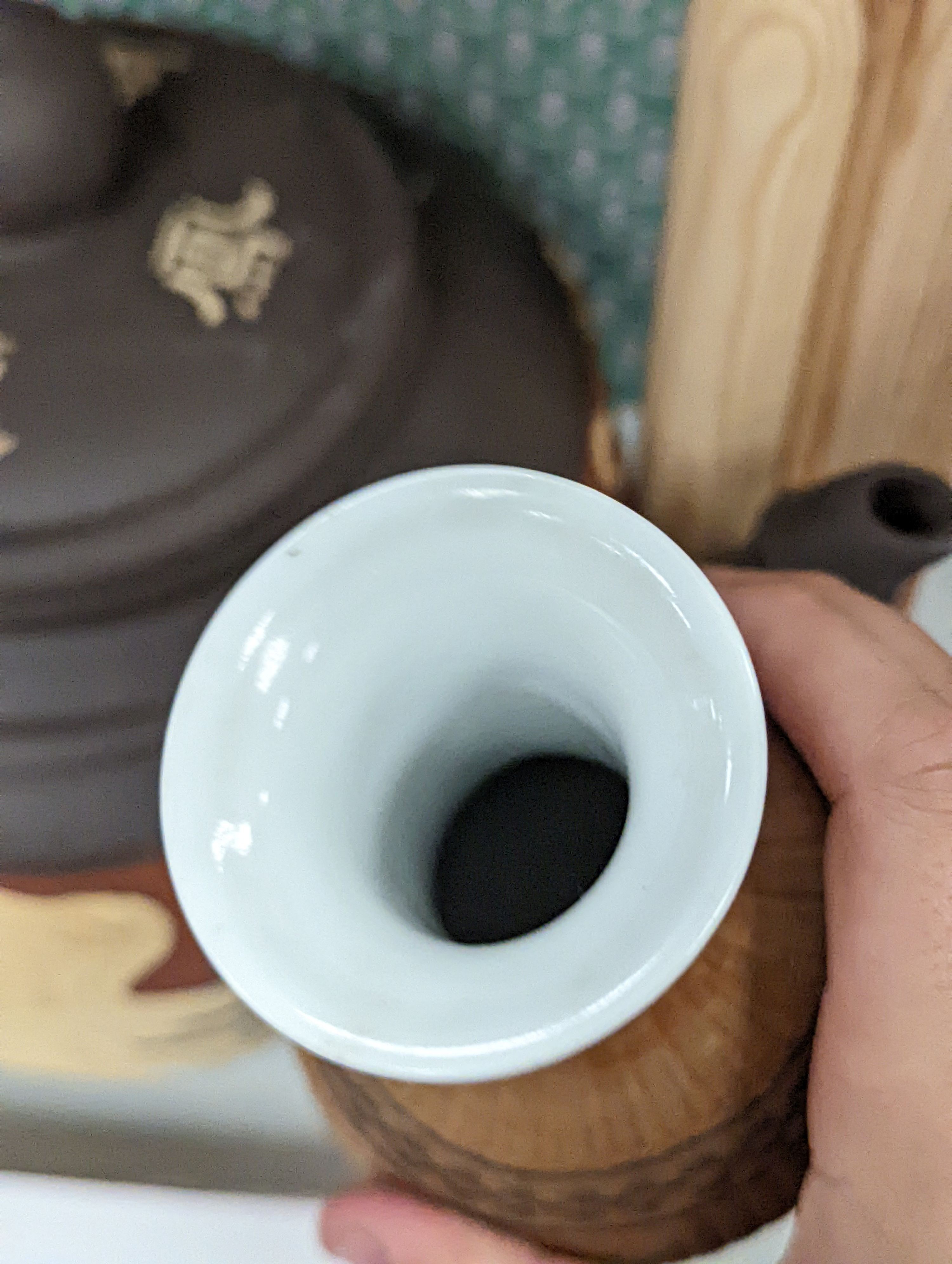 Three Chinese blue and white ginger jars and covers, a celadon plate and bamboo covered vase (5)